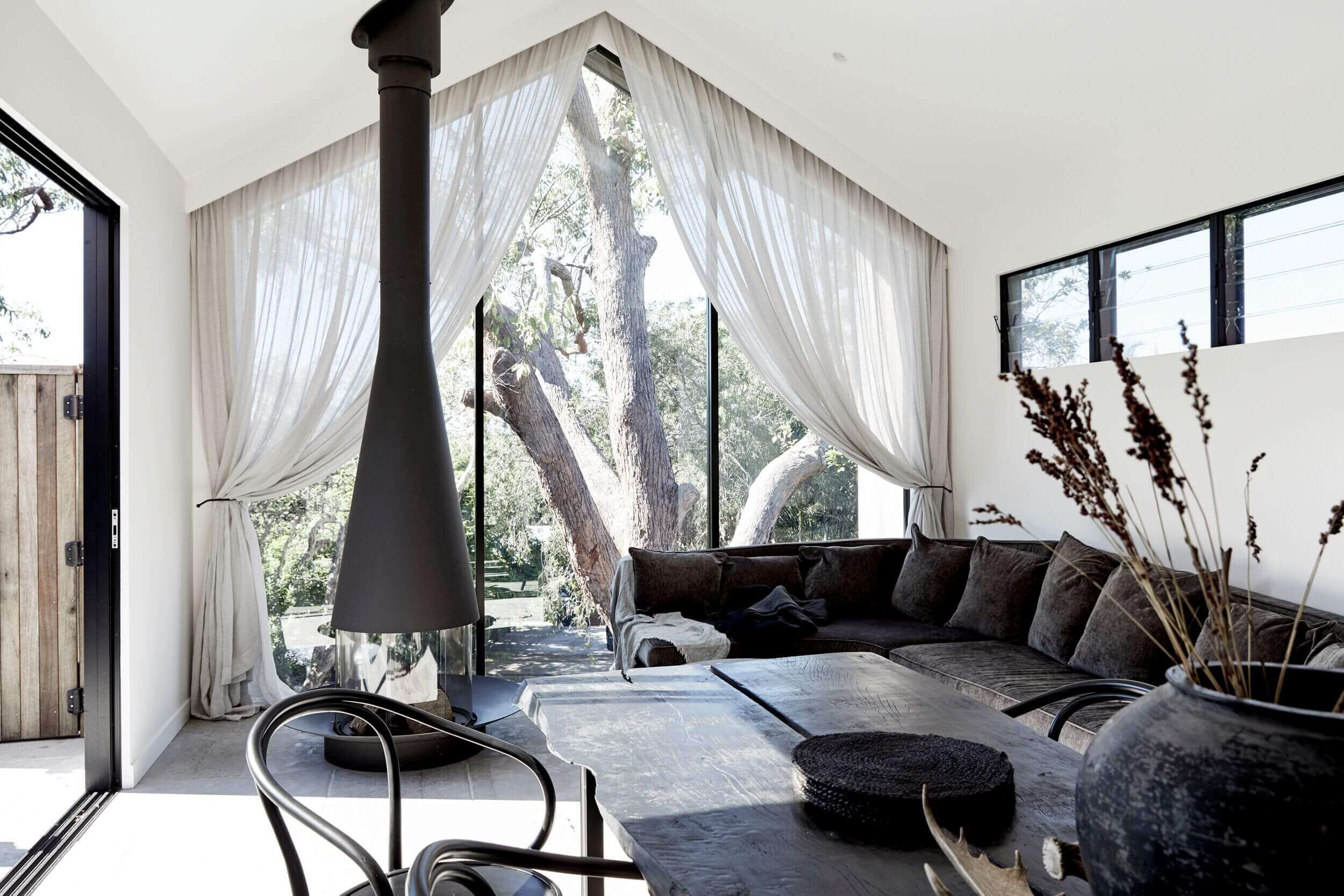 Lounge and dining room at The Cabin, Byron Beach Abodes