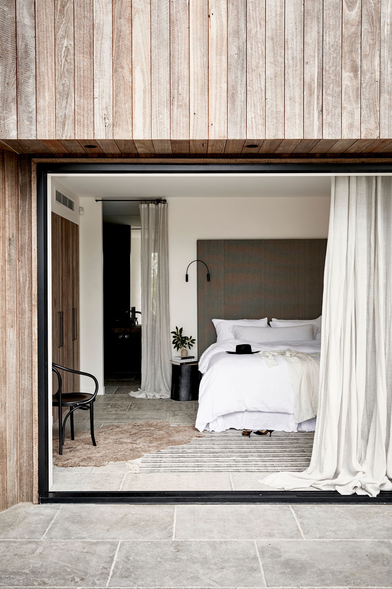 Master bedroom at The Cabin, Byron Beach Abodes