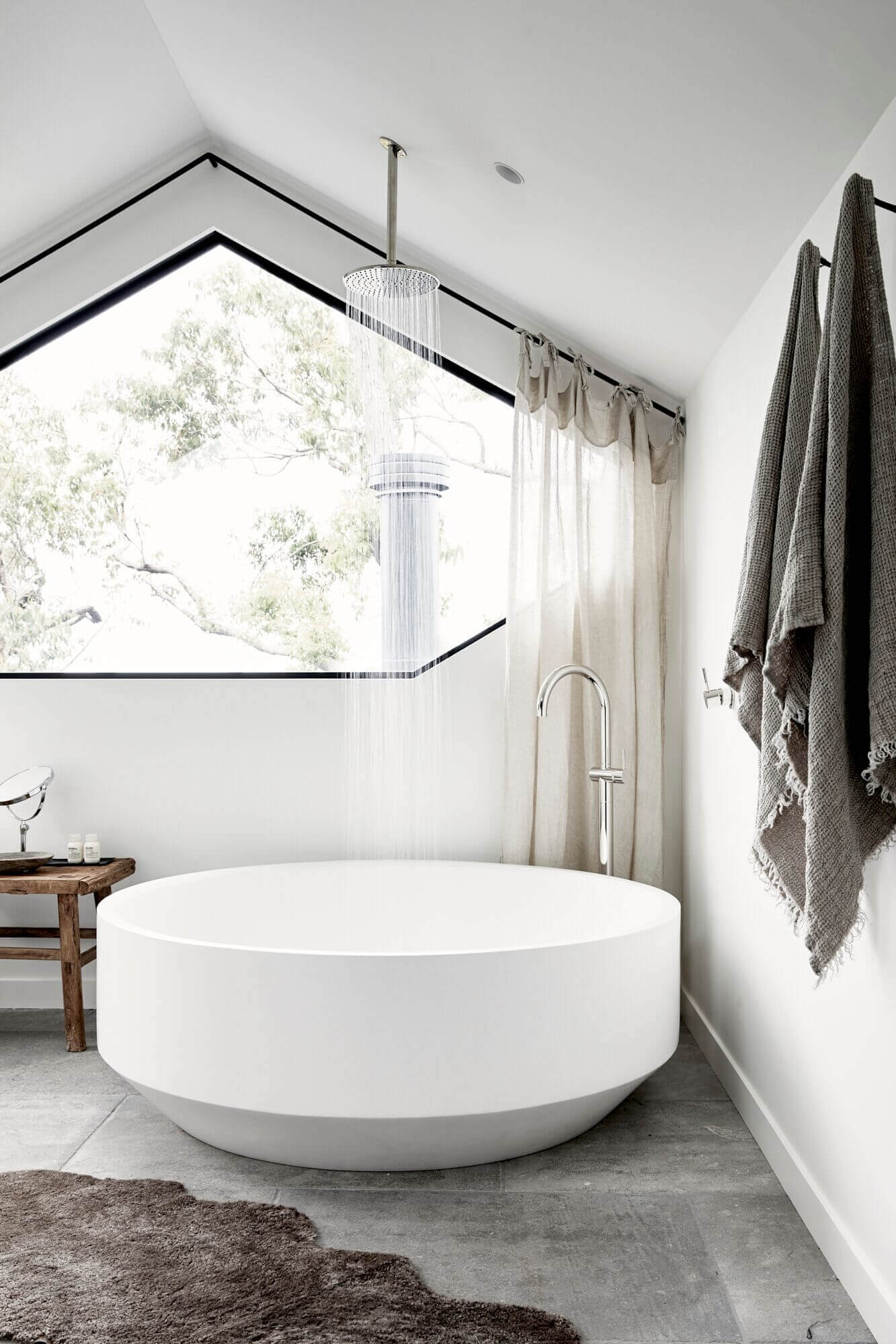 Round stone bath at The Cabin, Byron Beach Abodes