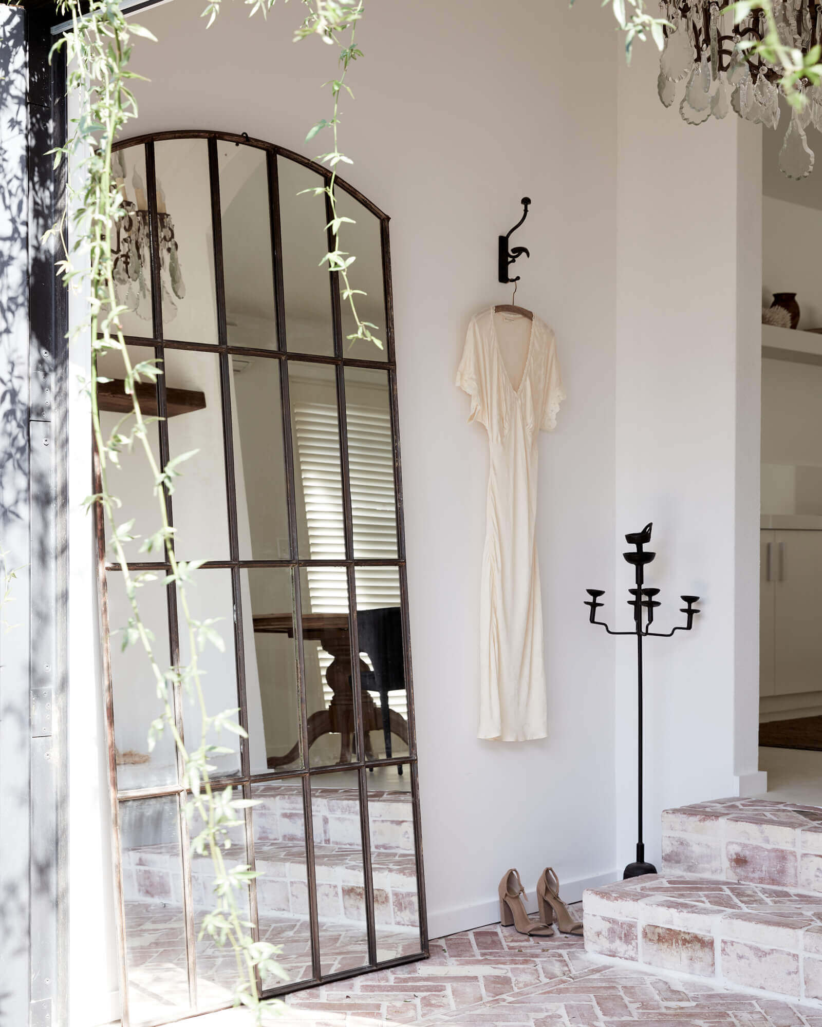 Oversized, vintage panelled mirror at the entrance to the Le Viti Barn Newrybar: