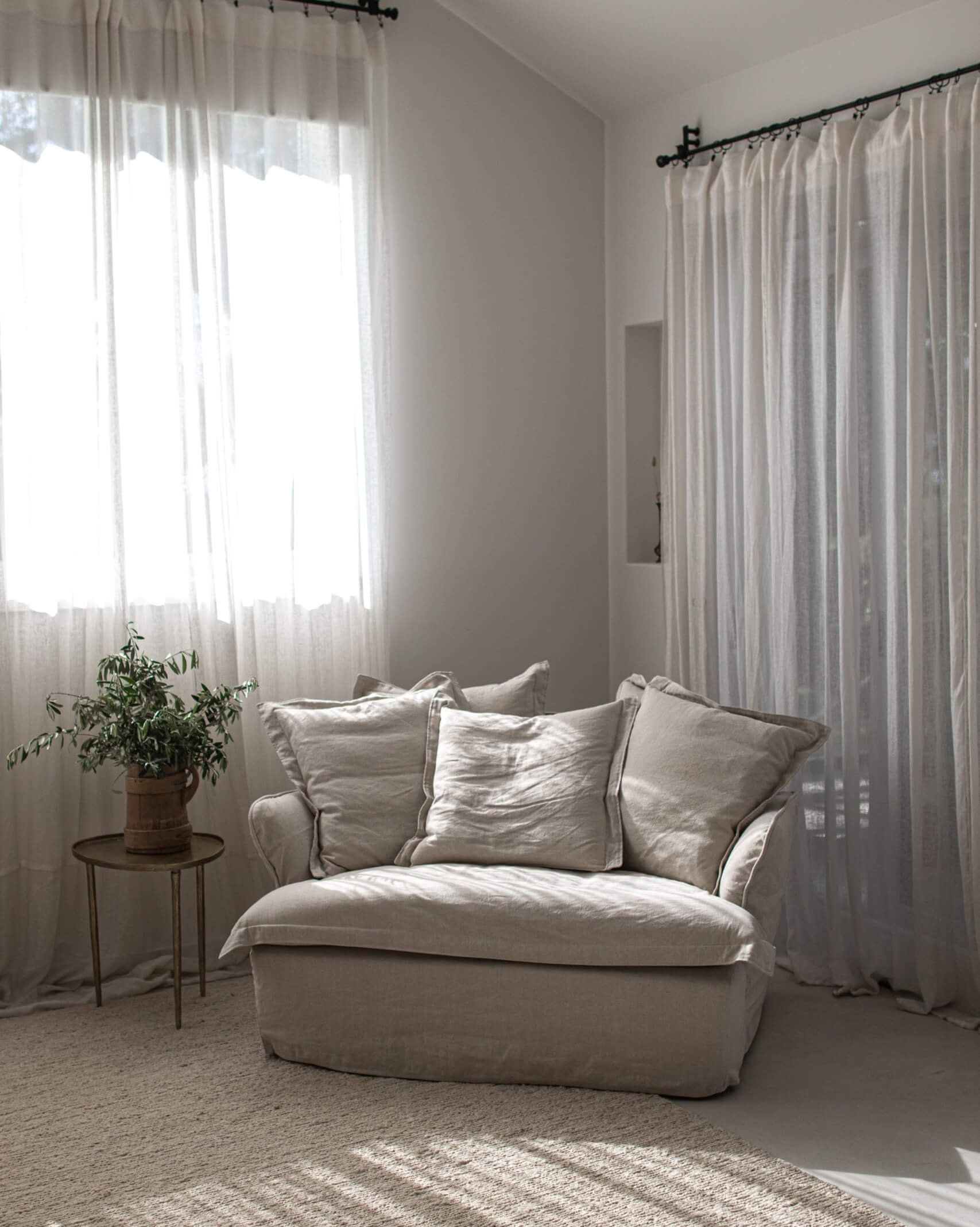 Plush and cosy Maker and Son oversized armchair in the master bedroom of Le Viti Barn Newrybar