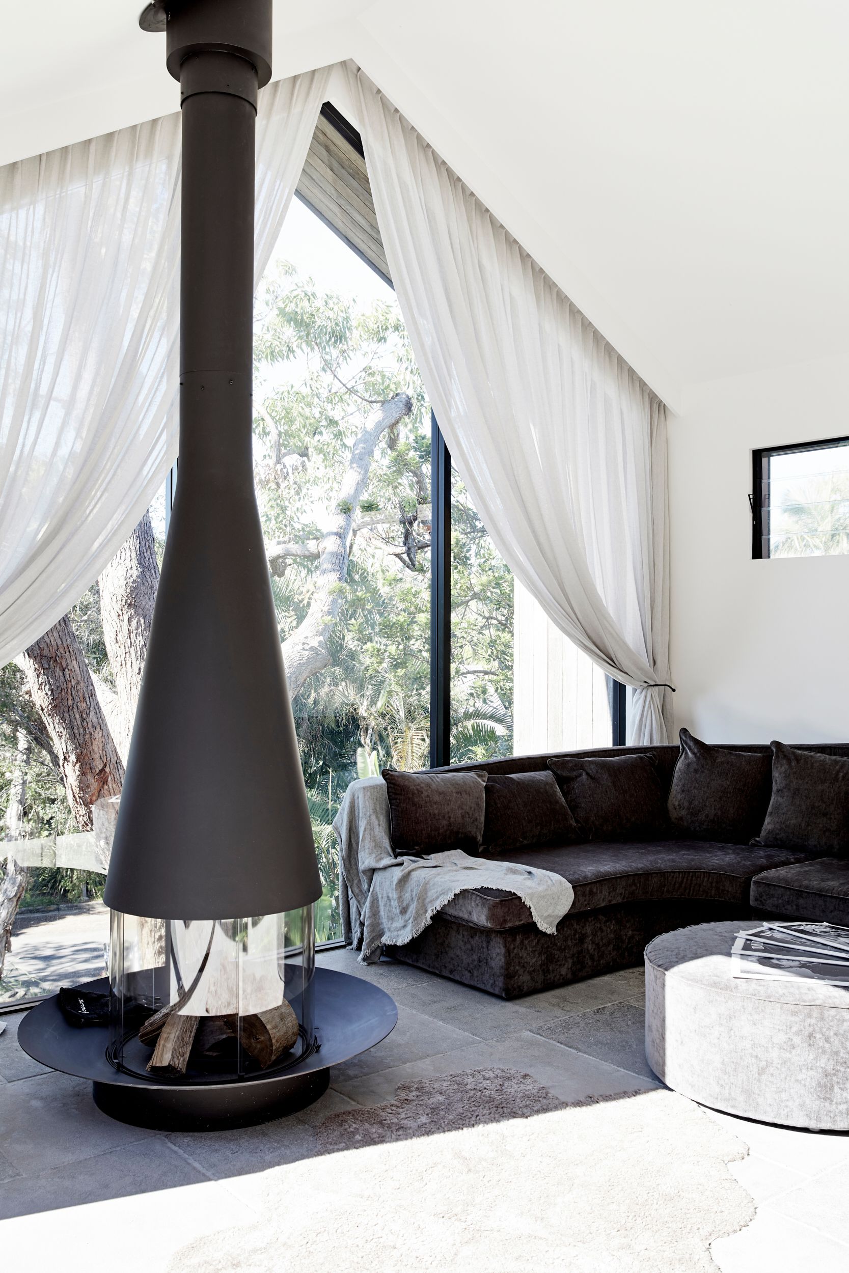 Oblica fireplace in the lounge room at The Cabin, Byron Beach Abodes
