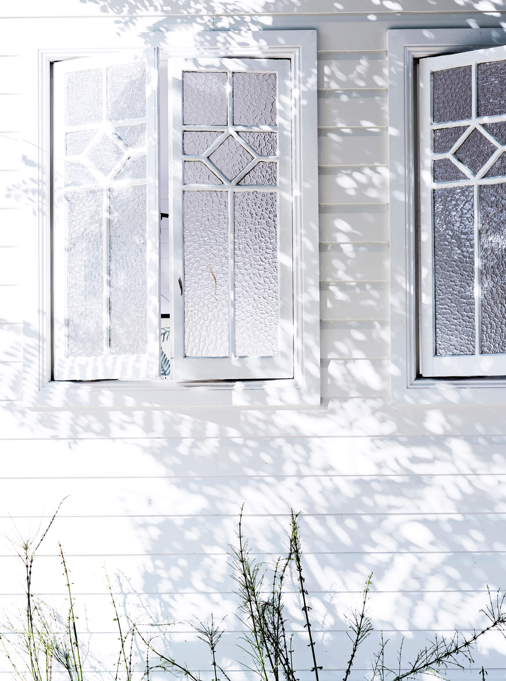 Recycled timber windows with mottled glass at the Bower Barn, The Bower Byron Bay hotel