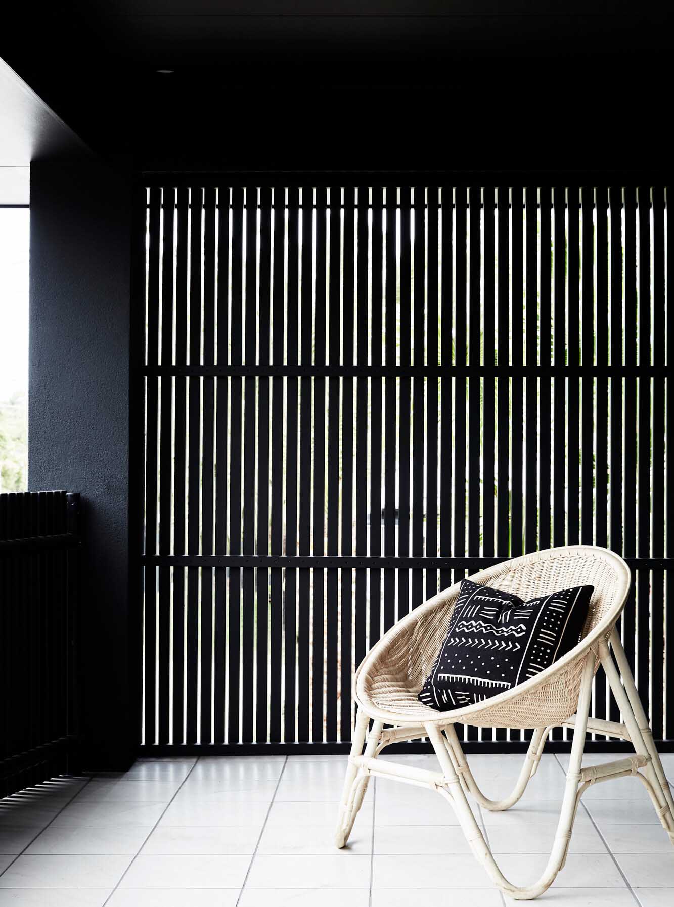 Tigmi Trading cane occasional chair on the balcony of the Bower House, The Bower Byron Bay