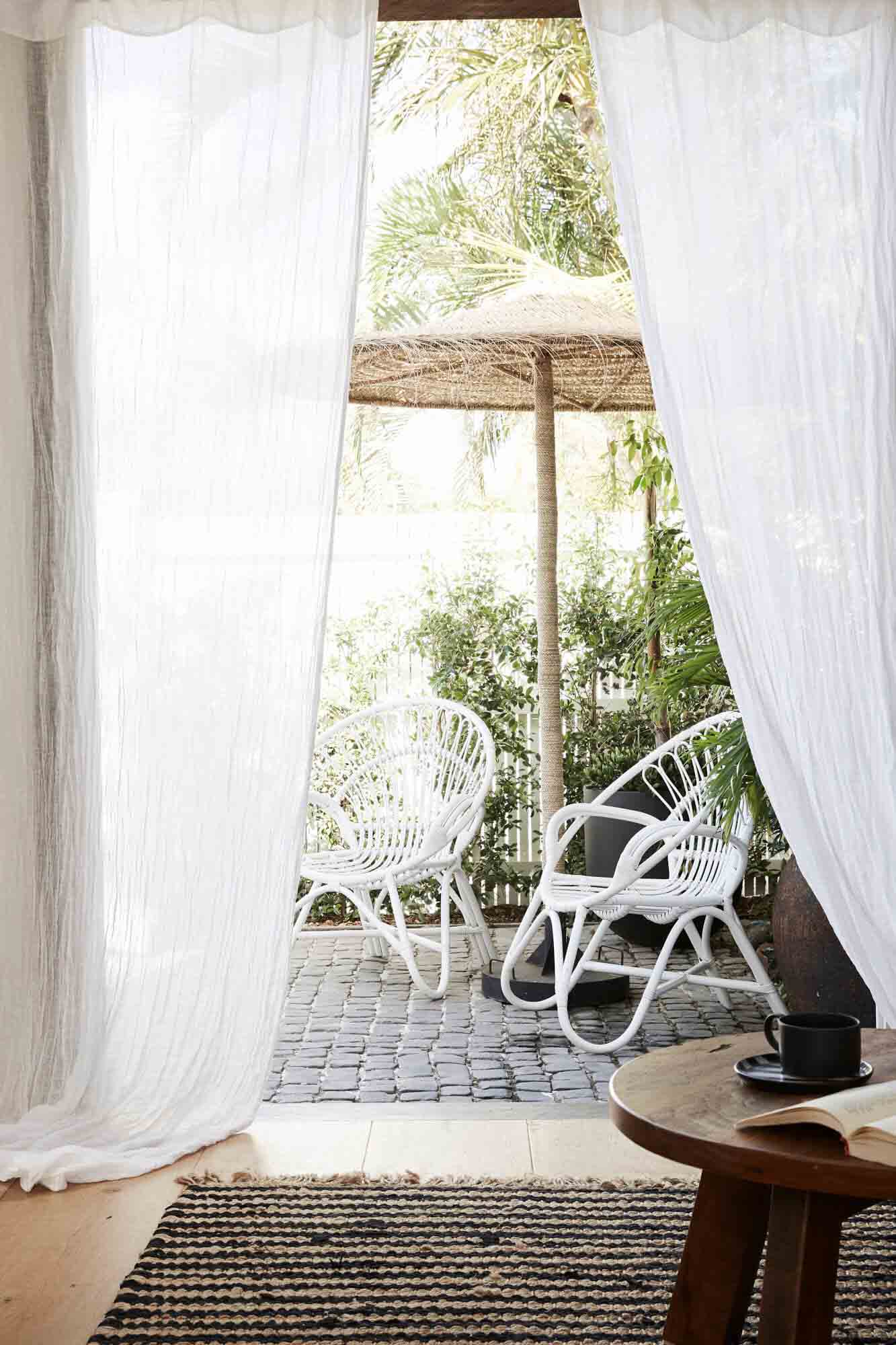 Looking to the private courtyard from the inside of the Bower Barn at The Bower Byron Bay hotel