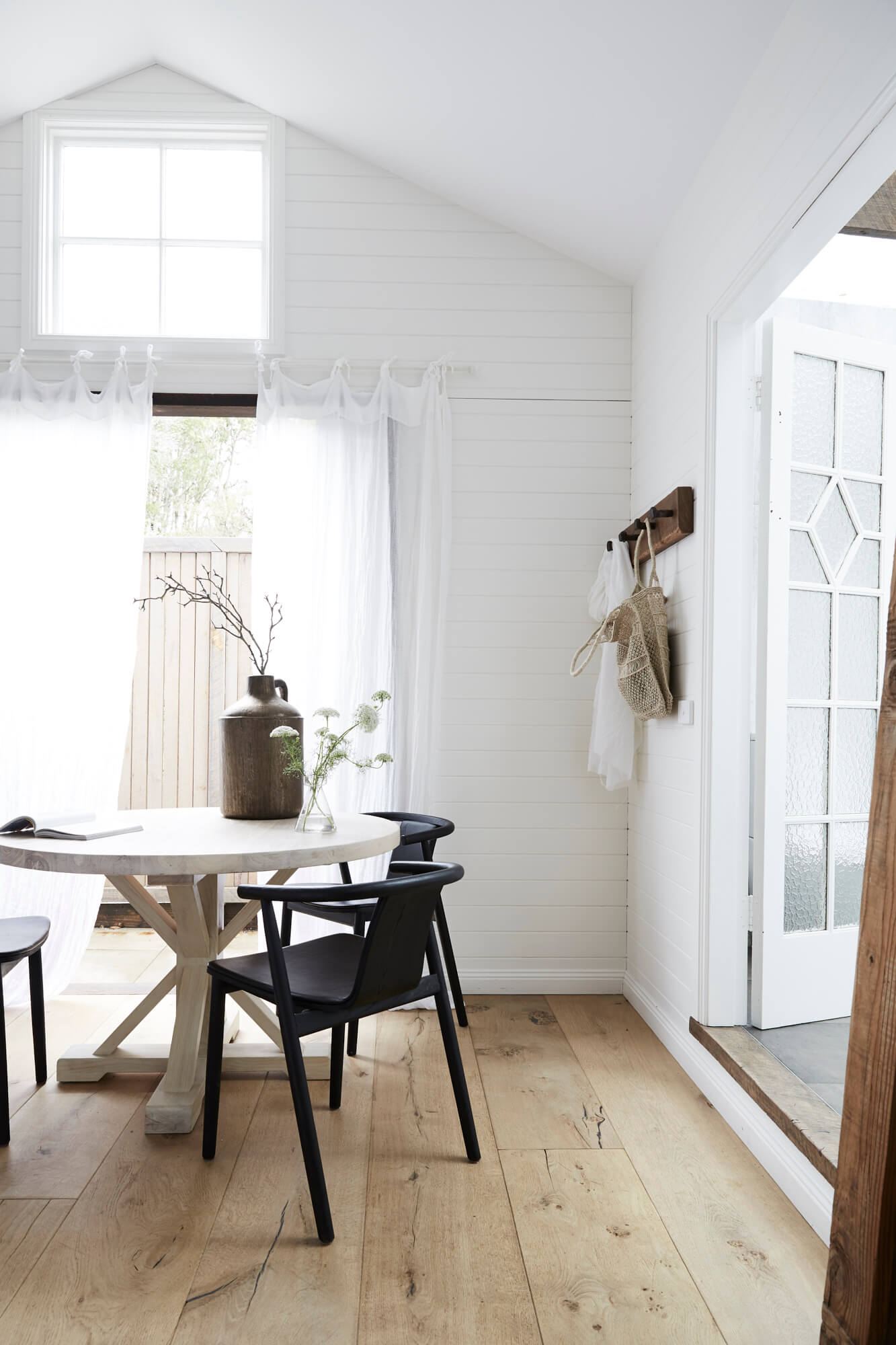 MCM House dining table and chairs at the Bower Barn, The Bower Byron Bay hotel
