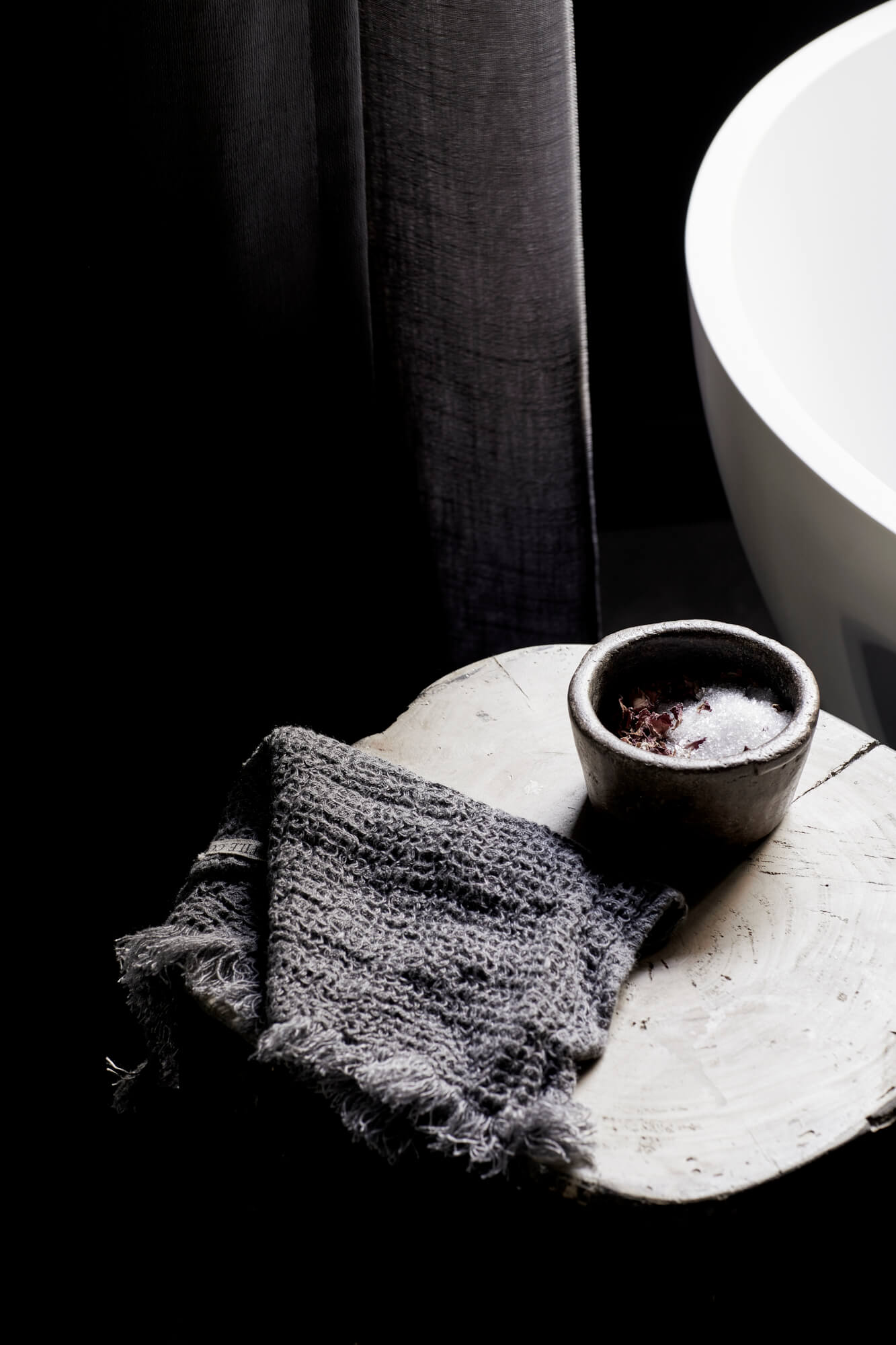 Handmade bath salts on timber stool at the Bower Studios at The Bower Byron Bay hotel